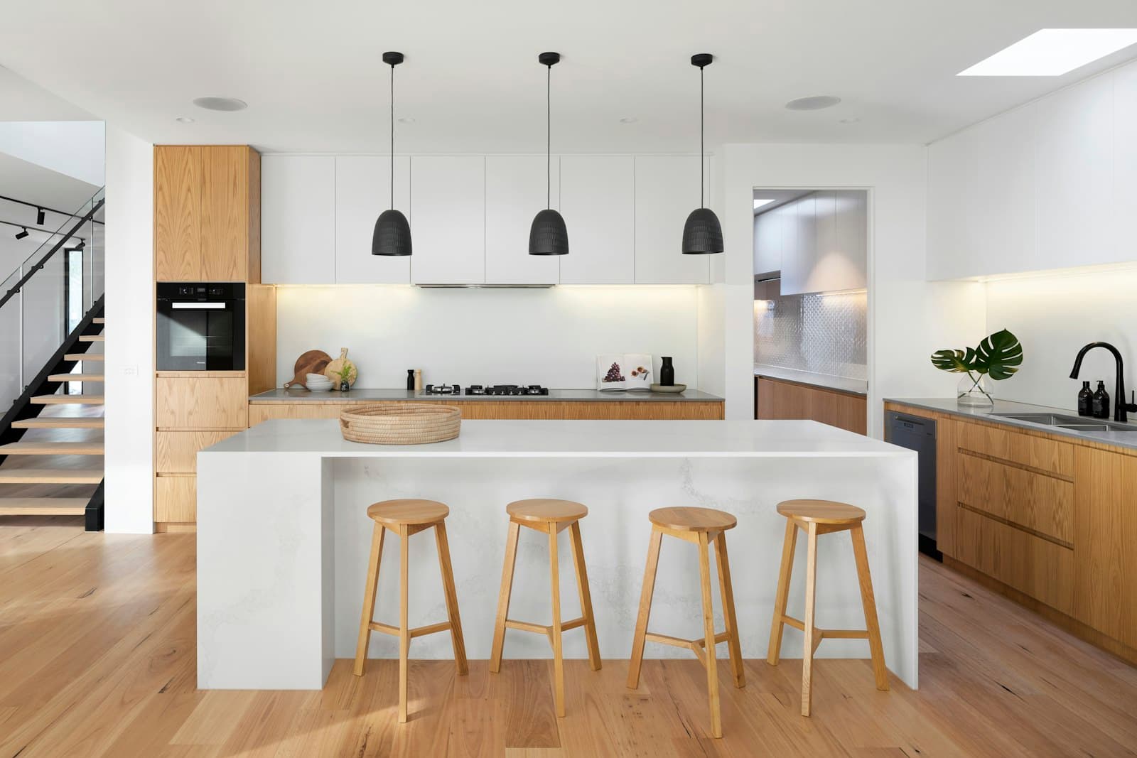 Renovated kitchen with island by CraftWell Group in London Ontario